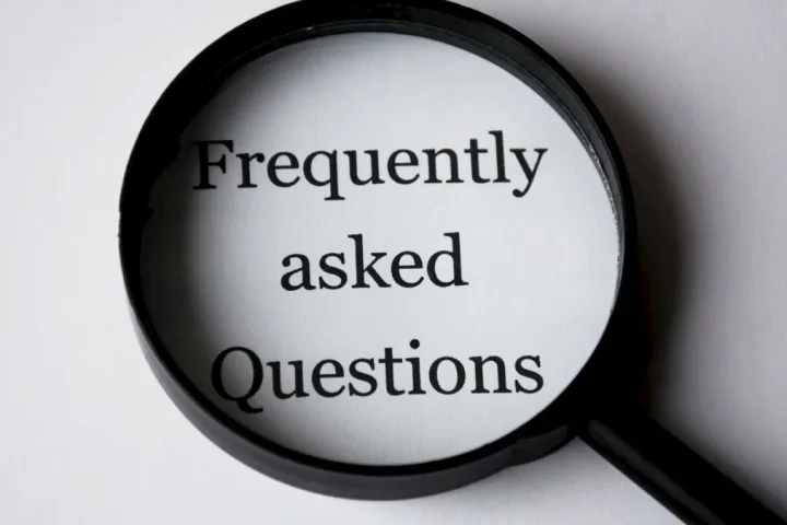 magnifying glass over 'Frequently asked Questions'