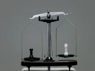 balance scale on a plain background