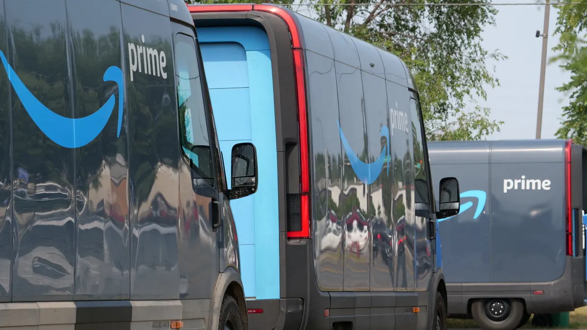 How to update old Amazon affiliate articles for better rankings — Amazon delivery vans parked in an urban area